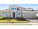 Charming single-Gathering home featuring a well-manicured lawn and a two-car garage at 617 Mosaic Blvd, Daytona Beach, FL 32124