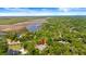 Aerial view showing proximity of property to marsh and waterways at 6185 Shoreline Dr, Port Orange, FL 32127