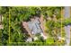 Aerial view of property surrounded by lush greenery at 6185 Shoreline Dr, Port Orange, FL 32127
