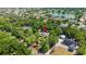 Aerial view showing the property and its surroundings, including a lake at 6185 Shoreline Dr, Port Orange, FL 32127
