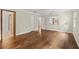 Spacious bedroom with wood flooring, white trim, and lots of natural light at 6185 Shoreline Dr, Port Orange, FL 32127