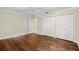 Bedroom featuring hardwood floors and a closet at 6185 Shoreline Dr, Port Orange, FL 32127