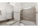 Neutral full bathroom featuring a shower-tub combo and a single sink vanity at 633 Mosaic Blvd, Daytona Beach, FL 32124