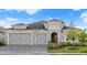 Beautiful single-story home featuring a paved driveway and a 3-car garage at 633 Mosaic Blvd, Daytona Beach, FL 32124