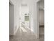 Bright hallway with tile flooring leading to the living areas at 633 Mosaic Blvd, Daytona Beach, FL 32124