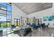 Spacious lounge area with comfortable seating, lake views, and large windows that bring in an abundance of natural light at 633 Mosaic Blvd, Daytona Beach, FL 32124