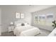 Comfortable bedroom with shuttered windows, neutral colors, and plush carpeting at 633 Mosaic Blvd, Daytona Beach, FL 32124