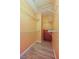 Walk in closet with a custom shelving system and wood-look floors at 719 S Beach St # 302B, Daytona Beach, FL 32114