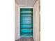 Spacious, painted linen closet with several shelves for storage at 719 S Beach St # 302B, Daytona Beach, FL 32114