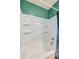 Clean white shower tub combination with molded shelving for toiletries at 719 S Beach St # 302B, Daytona Beach, FL 32114