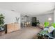 Spacious living room combines seating and dining areas for seamless entertaining and comfortable living at 736 Lindenwood W Cir, Ormond Beach, FL 32174