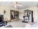 Covered patio featuring tile floors, home gym, and plenty of space to relax in the shade at 736 Lindenwood W Cir, Ormond Beach, FL 32174