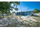 Backyard with full fence and access to screened porch at 925 Halstead St, Deltona, FL 32725