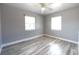 Bright bedroom with neutral gray walls and modern flooring, offering abundant natural light at 925 Halstead St, Deltona, FL 32725