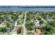 Scenic aerial view of a residential street, highlighting the home's proximity to the waterfront and green spaces at 952 Northbrook Dr, Ormond Beach, FL 32174