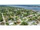 Aerial shot of a neighborhood near the water, showcasing the home's location in a lush, green community at 952 Northbrook Dr, Ormond Beach, FL 32174