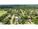 Aerial view of property in a residential neighborhood with mature trees and well-maintained lawns at 952 Northbrook Dr, Ormond Beach, FL 32174