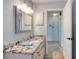 Comfortable bathroom with granite countertop and a view to the hallway at 952 Northbrook Dr, Ormond Beach, FL 32174