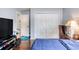 Well-organized bedroom featuring a double door closet and a queen size bed at 952 Northbrook Dr, Ormond Beach, FL 32174