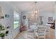 Comfortable dining space with tile floors, neutral wall color, and a charming decor at 952 Northbrook Dr, Ormond Beach, FL 32174