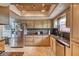 Functional kitchen featuring granite countertops, stainless steel appliances, and ample cabinet space at 952 Northbrook Dr, Ormond Beach, FL 32174