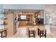 Well-designed kitchen with stainless appliances, granite counters and breakfast bar seating at 952 Northbrook Dr, Ormond Beach, FL 32174