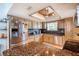Lovely kitchen features stainless steel appliances, granite counters and custom backsplash at 952 Northbrook Dr, Ormond Beach, FL 32174