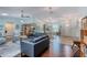 Open living space with modern decor, flowing to the dining area and kitchen at 952 Northbrook Dr, Ormond Beach, FL 32174