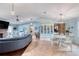 Open living room with elegant furnishings and a dining area, perfect for entertaining guests at 952 Northbrook Dr, Ormond Beach, FL 32174