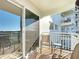 Balcony with outdoor seating and sliding glass doors at 100 Silver Beach Ave # 608, Daytona Beach, FL 32118