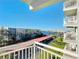 This balcony has seating and views of the water and a bridge at 100 Silver Beach Ave # 608, Daytona Beach, FL 32118