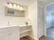 Bathroom with ample counter space, cabinets, and a large mirror at 100 Silver Beach Ave # 608, Daytona Beach, FL 32118