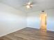 A bright bedroom with a ceiling fan and wood floors at 100 Silver Beach Ave # 608, Daytona Beach, FL 32118