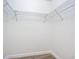 Empty closet with wire shelving and wood-look floor at 100 Silver Beach Ave # 608, Daytona Beach, FL 32118