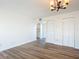 Open-concept living area with modern flooring, a chandelier, and access to the kitchen at 100 Silver Beach Ave # 608, Daytona Beach, FL 32118
