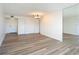Cozy living room with wood flooring and a mirrored wall at 100 Silver Beach Ave # 608, Daytona Beach, FL 32118