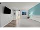 Comfortable main bedroom with a calming blue accent wall at 102 Bob White Ct # 102C, Daytona Beach, FL 32119