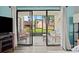 Screened patio with comfortable seating, offering a relaxing outdoor living space at 102 Bob White Ct # 102C, Daytona Beach, FL 32119