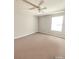 Clean bedroom featuring carpet flooring, ceiling fan and natural light at 103 Manor View Ln, Deland, FL 32724