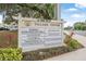 Prominent sign displaying the various businesses within the community village center at 103 Manor View Ln, Deland, FL 32724