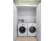 Efficient laundry room features modern washer and dryer units, offering a dedicated space for laundry tasks at 1057 Shady Hollow Dr, Deland, FL 32724