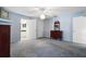 Serene main bedroom features soft carpeting, ample natural light, and en-suite access, providing a private retreat at 1057 Shady Hollow Dr, Deland, FL 32724