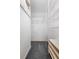 Functional walk-in closet featuring wire shelving, providing organized storage space for clothing and accessories at 1057 Shady Hollow Dr, Deland, FL 32724