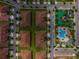 Overhead view showcasing the well-organized neighborhood layout with a pool and playground nearby at 1079 Quaker Ridge Ln, Davenport, FL 33896