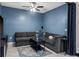 Inviting living room with a gray sectional sofa and modern decor at 1079 Quaker Ridge Ln, Davenport, FL 33896