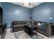 Comfortable living room with a plush sectional sofa and a stylish area rug at 1079 Quaker Ridge Ln, Davenport, FL 33896