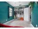 bedroom featuring storage shelves, a closet, and a ceiling fan for comfort and style at 1090 Wakefield Cir, Deltona, FL 32725