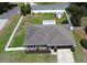 Aerial view of the home showcasing the fenced-in yard and backyard shed at 116 Neal Dr, Deltona, FL 32738