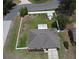 A high aerial view showcasing a large backyard and full roof of the house at 116 Neal Dr, Deltona, FL 32738