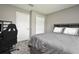 This bedroom features neutral walls, carpet flooring, and a closet for storage at 116 Neal Dr, Deltona, FL 32738